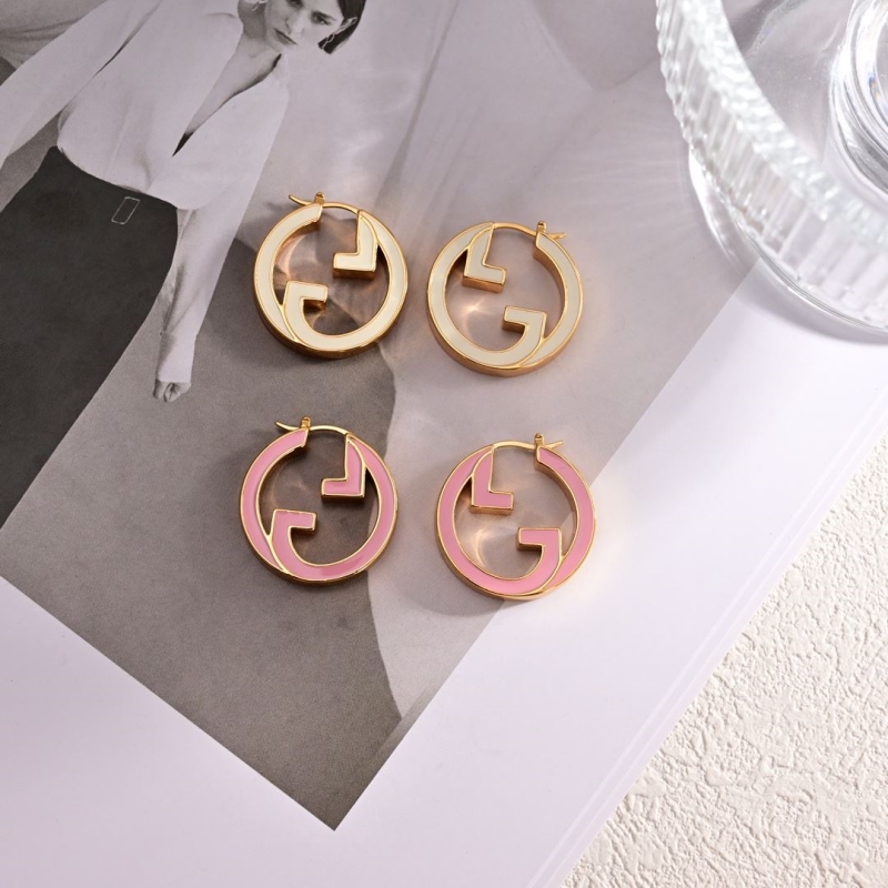 G*u*i earrings
